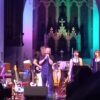 Spencer Segelov and his band on stage performing his greatest hits