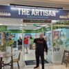 EJ stood outside The Artisan coffee shop